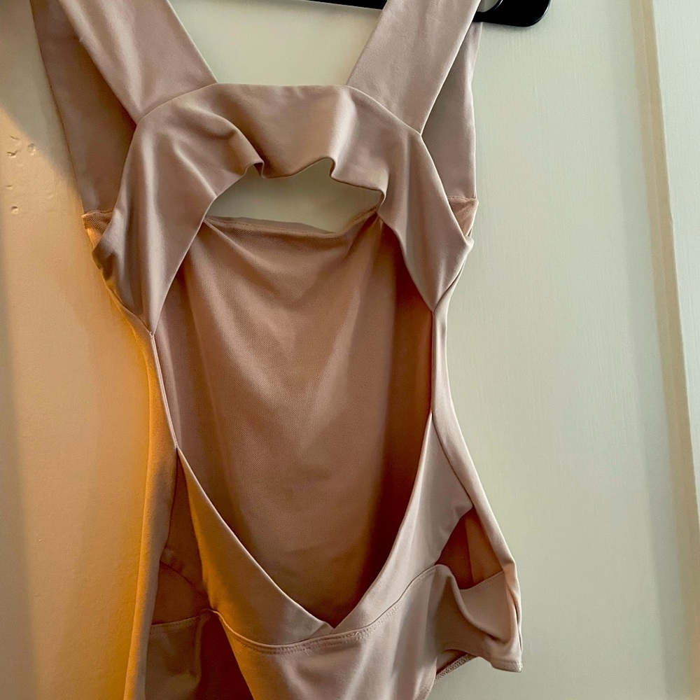 FreePeople Light Pink Body Suit with cutouts